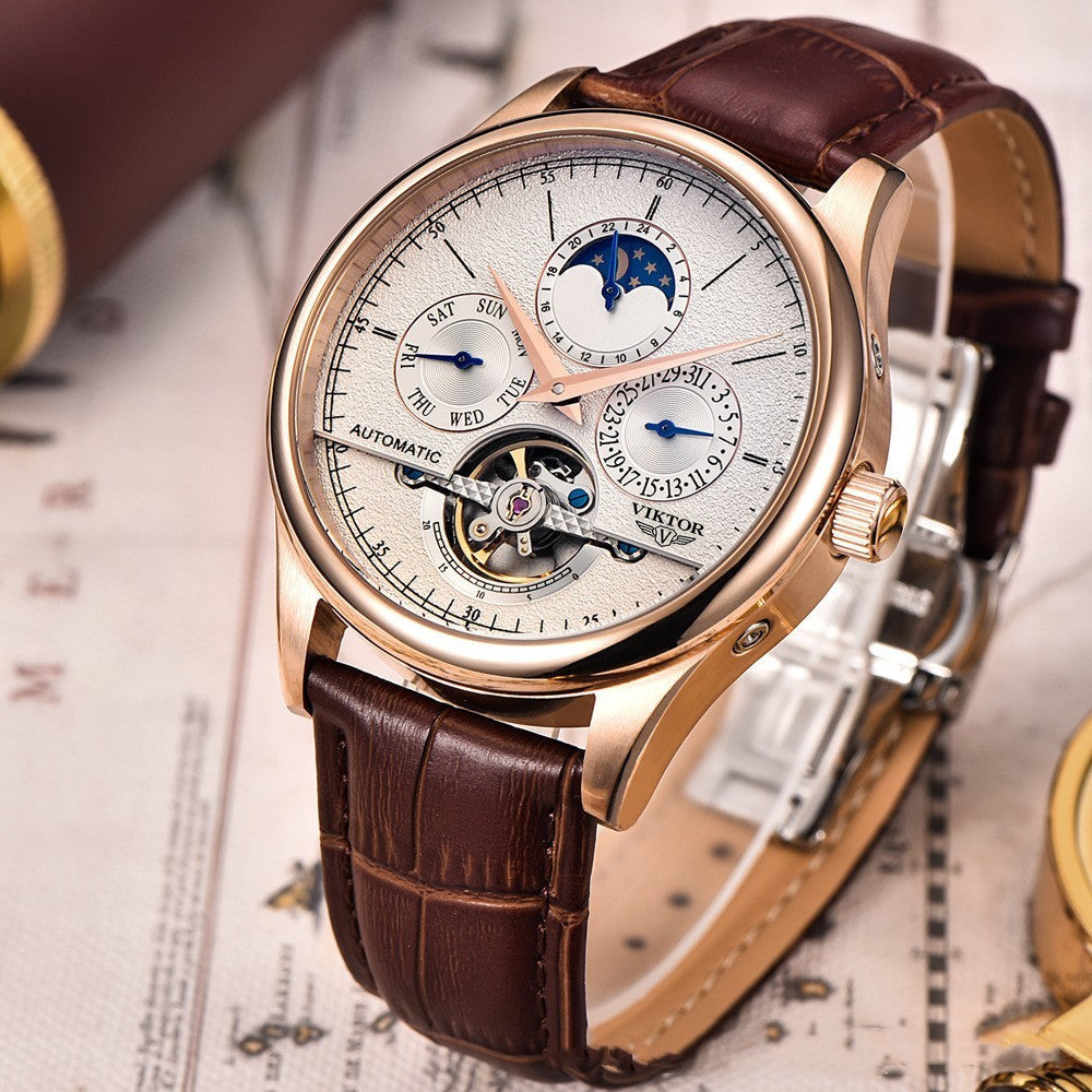 Luxury silver watch on textured background
